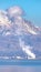 Vertical Plume of smoke rising from a fire on Utah Lake