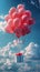 Vertical portrait of balloons with present birthday box flying