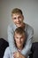 Vertical portrait of a beautiful LGBT couple. Beautiful smile of a young man.