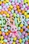 Vertical portrait of Easter letters with eggs and plush bunny