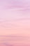 Vertical ratio size of sunset background. sky with soft and blur pastel colored clouds. gradient cloud on the beach resort.