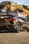 Vertical rear view of a grey Chevrolet corvette c8 on the road