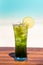 Vertical refreshing mojito mocktail on wooden table ocean background at the beach