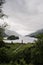 Vertical scenic view of the beautiful Glenfinnan mountain and lake Loch Shiel in Scotland