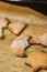 Vertical selective focus shot of fresh moon-shaped gingerbread in soft focus