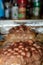 Vertical selective focus shot of frozen burgers out of the oven - cooking gone wrong