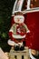 Vertical selective focus shot of a stuffed snowman decoration