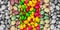 Vertical set of candy set bright contrast gray monochrome pink dragee yellow green base