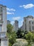 Vertical shot of aged residential buildings in the daytime