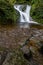 Vertical shot of the All Saints waterfall, Oppenau, Black Forest, Germany
