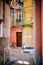 Vertical shot of the alley and colorful buildings captured in Menton, French Riviera, France