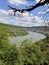 Vertical shot of an amazing lake with both sides villages under cloudy sky