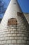 Vertical shot of an ancient brick chimney