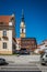 Vertical shot of an ancient church tower in Poland