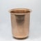 Vertical shot of an antique cup on a plain background
