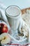 Vertical shot of an apple shake on the white background