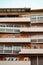 Vertical shot of the architectural balconies of the building