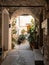 Vertical shot of an archway leading to a garden in Vernazza, Cinque Terre, Italy