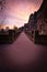 Vertical shot of Bastei bridge in Saxon Switzerland National Park under colorful susnet