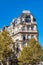 Vertical shot of a beautiful building in Square des Batignolles Paris, France