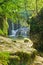 Vertical shot of a beautiful landscape with Geratser waterfall in Allgau in Germany