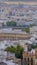 Vertical shot of the beautiful old cityscape of Seville with traditional architecture in Spain