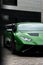 Vertical shot of a beautiful sleek luxurious Lamborghini Huracan Sto parked outdoors