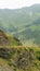 Vertical shot of a beautiful view on mountain road, abyss, dangerous road