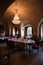 Vertical shot of a beautiful wedding venue with an organized table and a chandelier