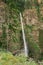 Vertical shot of the Benson Bridge over Multnomah Falls during the day