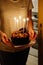Vertical shot of a birthday celebration chocolate cake with candles