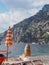 Vertical shot of a blonde female relaxing on a sunny beach in Positano on the Amalfi Coast