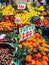 Vertical shot of boxes of delicious and fresh fruits in a farmer\\\'s market