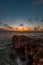 Vertical shot of a breathtaking sunset over the ocean in Bonaire, Caribbean