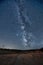 Vertical shot of a breathtaking view of the Milky Way at night in Casas de Don Pedro, Spain