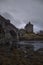 Vertical shot of the bridge leading to the medieval castle on the Eilean Donan island