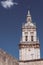 Vertical shot of the Catedral de Burgo de Osma with a blue sky in the background, Spain