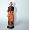 Vertical shot of a Catholic religious figurine of Saint Joseph holding a vessel