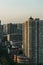 Vertical shot of the cityscape of Shanghai City at sunset with high residential buildings