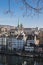 Vertical shot of the cityscape of Zurich with the Predigerkirch church steeple in Switzerland