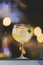 Vertical shot of a classic gimlet cocktail on the blurred background