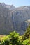 Vertical shot of cliffs and a waterfall. Cirque de Gavarnie, France.