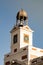 Vertical shot of the clock tower of Puerta del Sol, Post Office, Madrid, Spain