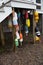 Vertical shot of colorful buoys hanging under stairs
