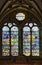 Vertical shot of colorful mosaic paintings on glasses of The Cathedral of Astorga, Spain