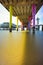 Vertical shot of colorful poles of a bridge in Scheveningen, Netherlands