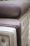Vertical shot of cream and gray shaded leather furniture