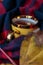 Vertical shot of a cup of tea surrounded in wool