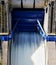 Vertical shot of the dam with running water. Costa Rica.