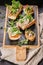 Vertical shot of delicious bruschetta and canape with turkey pate and microgreens. Traditional Mediterranean cuisine. Delicious